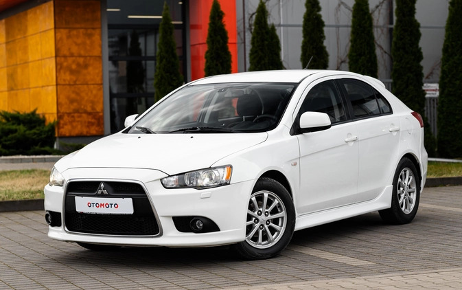 Mitsubishi Lancer cena 32900 przebieg: 150000, rok produkcji 2014 z Radom małe 596